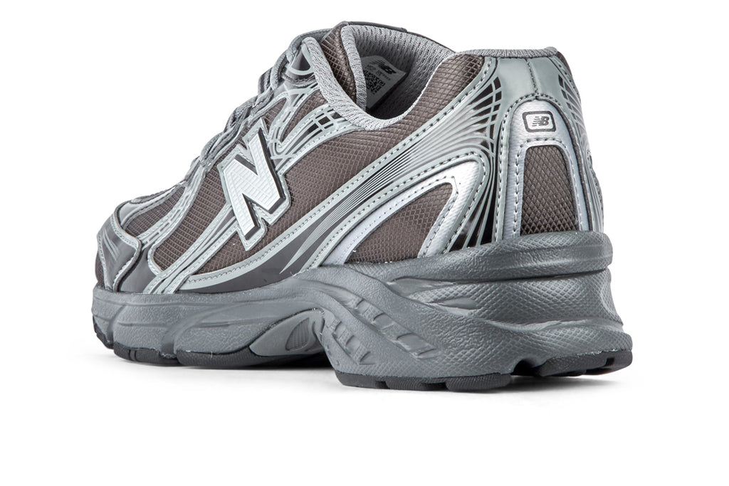 New Balance U7407YI - Castlerock/Black Metallic