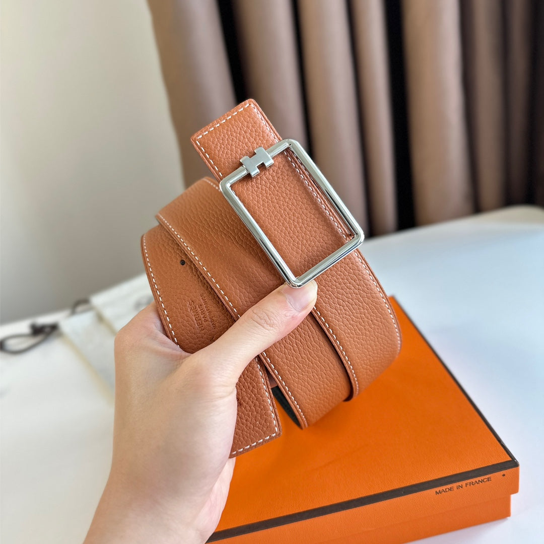HM TUBE H BELT BUCKLE & REVERSIBLE BLACK AND YAM ORANGE LEATHER STRAP 38MM SILVER HARDWARE